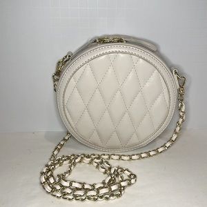 Cream quilted faux leather cross-body purse gold braid strap 6.5”Wx2”D 30” drop.